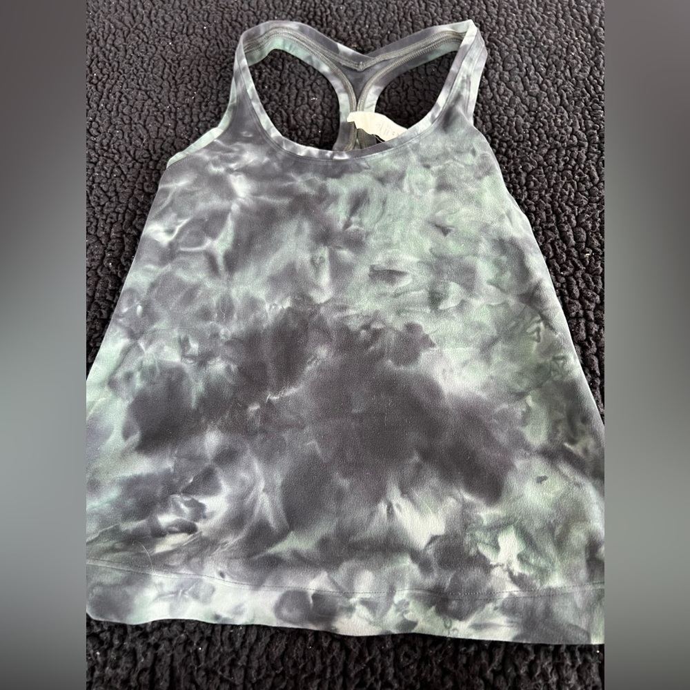 Lululemon swiftly tech racerback tank top. Size 4. Black and green